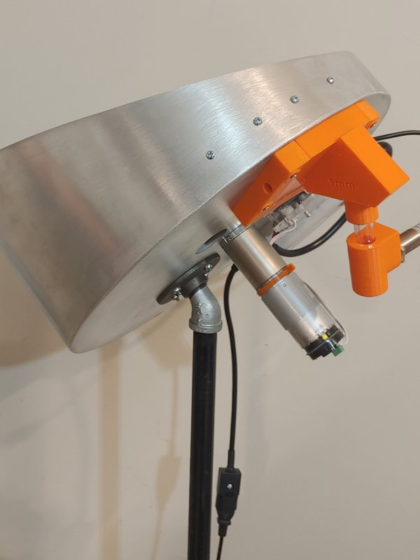 AccuFeed collator bowl with its drive and feed fingers on a mast mount